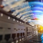 Blue network cable system in network rack have beautiful lighting and center picture focusing